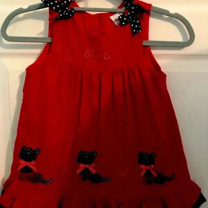 Girls red corduroy jumper.